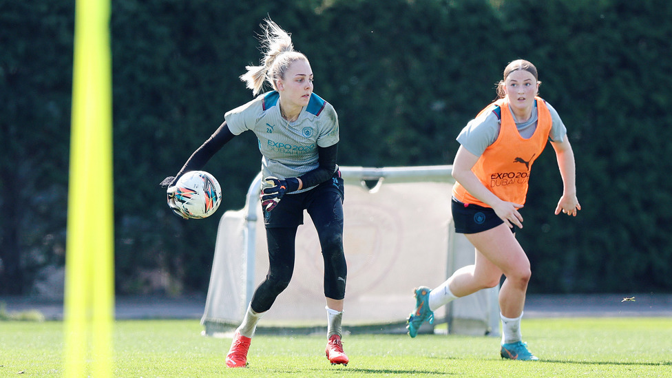 SAFE HANDS : Ellie Roebuck looks to start an attack.