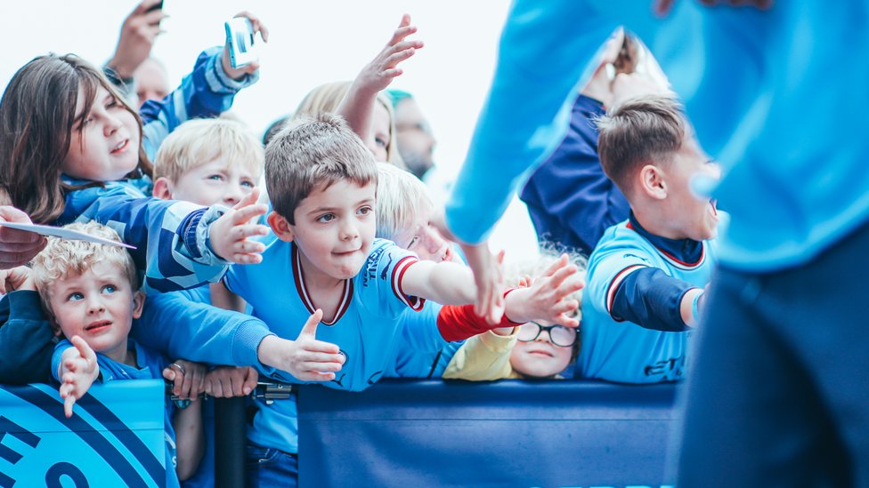 YOUNG BLUES: Our young fans high-fiving the players on arrival