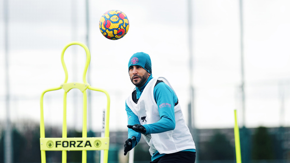 HAT TRICK: Riyad Mahrez was suitably kitted out to deflect the February chill