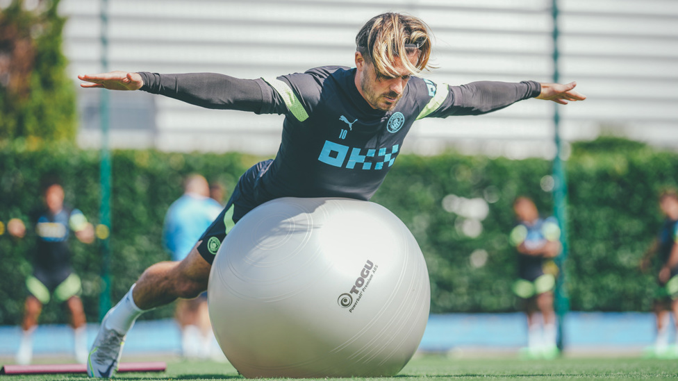 ON THE BALL : Jack Grealish tests his core strength