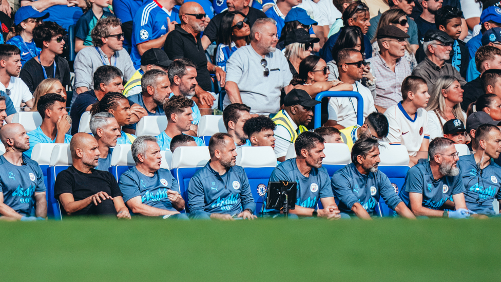 PEP TEAM : The boss and his backroom staff watch on.