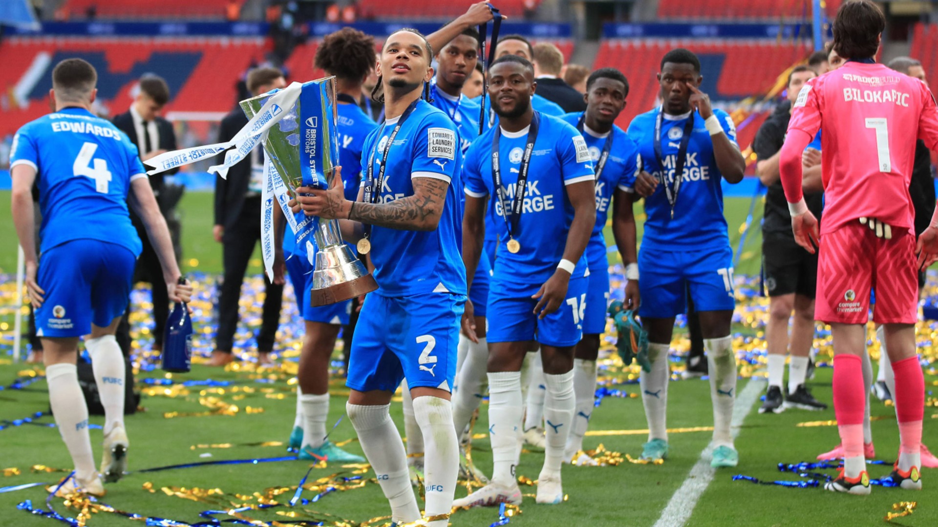 MOMENT TO SAVOUR: Katongo lifts the EFL Trophy at Wembley.