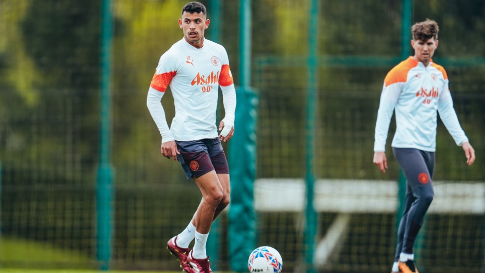 DYNAMIC DUO : Matheus Nunes on the ball as John Stones looks on