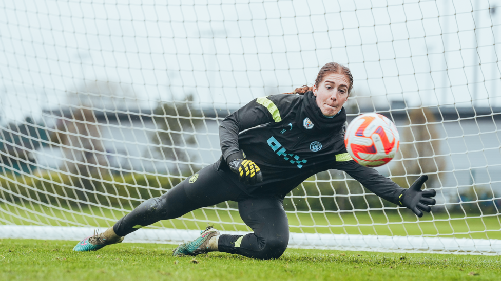 SAFE HANDS SANDY : Sandy MacIver keeps her eye on the ball as she's tested at the near post