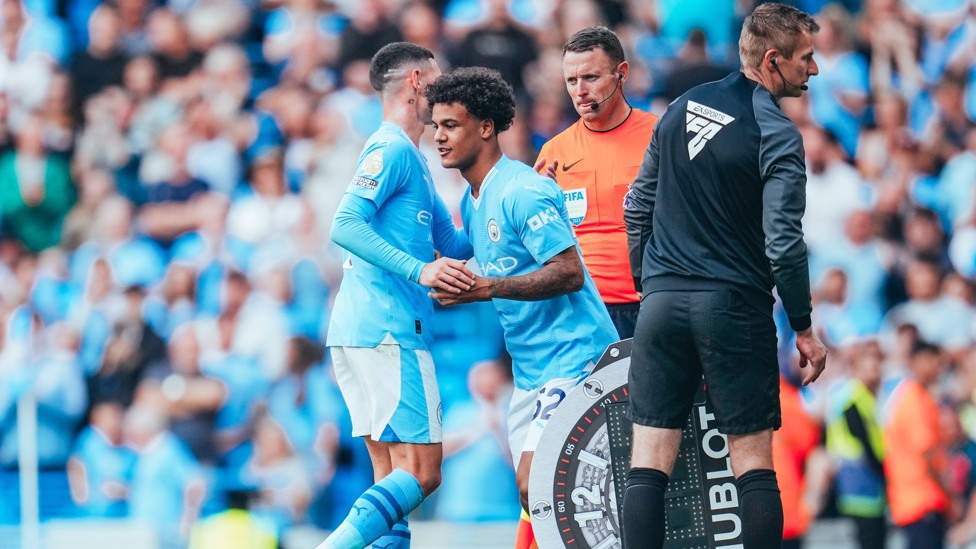 SENIOR DEBUT : Bobb replaces Phil Foden for his first Premier League appearance