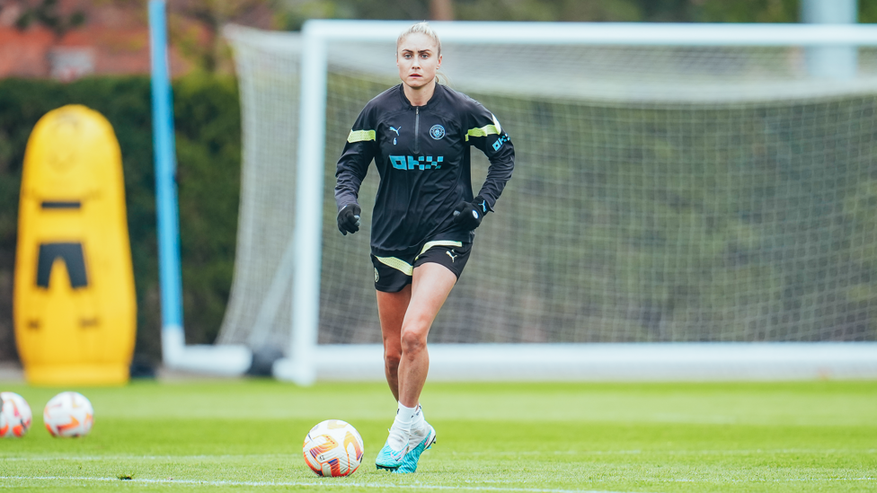 OUR CAPTAIN : Steph Houghton carries the ball forward in training.