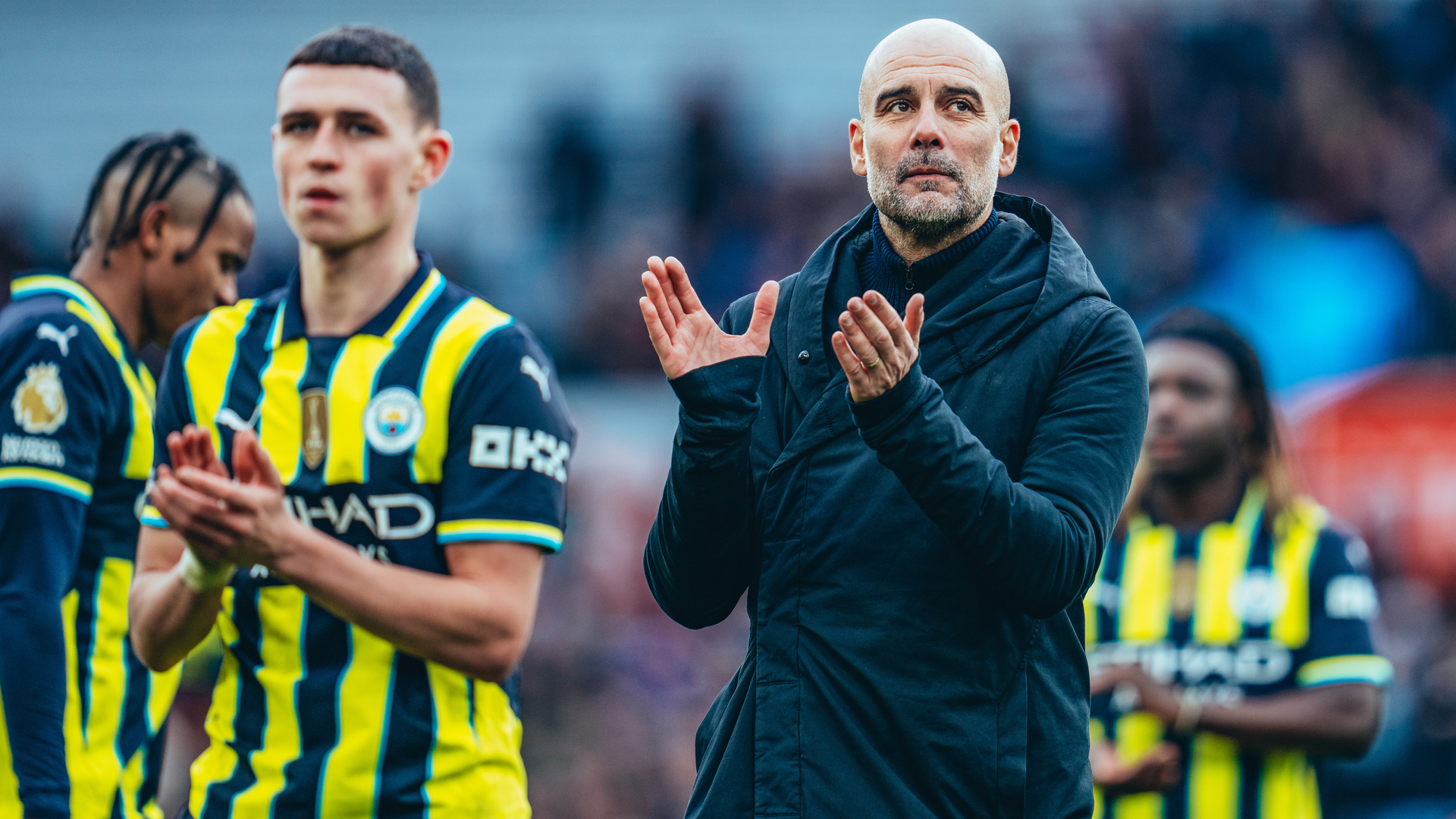 LOYAL SUPPORT: The boss and Phil Foden thank the travelling City fans at full time.