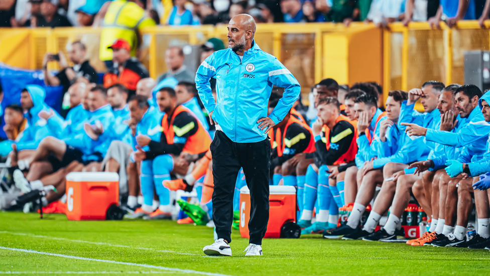 PEP TALK : The boss watches on from the touchline