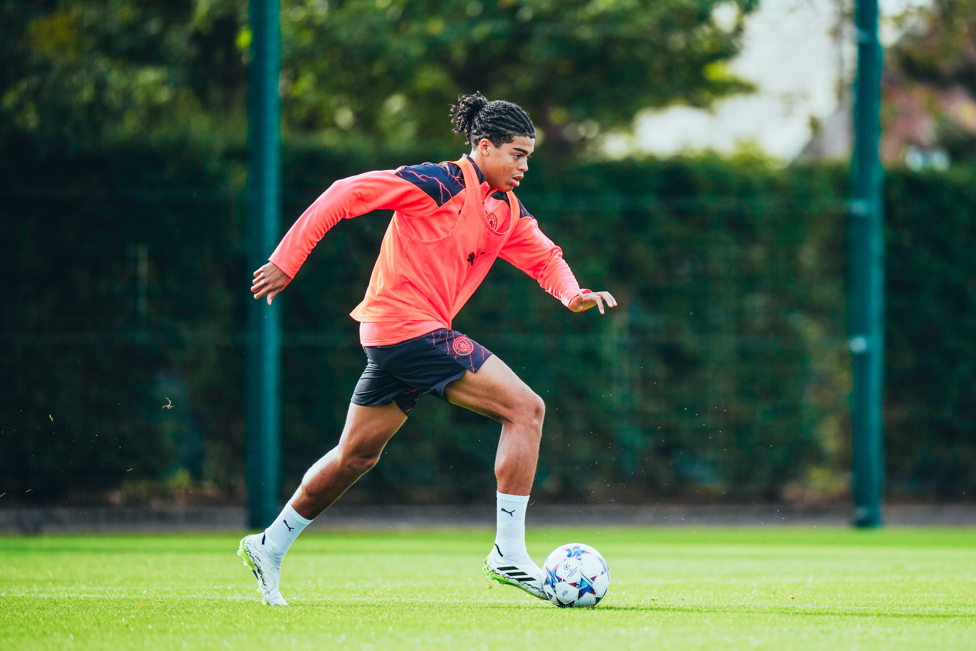 FANCY FOOTWORK  : Jahmai Simpson-Pusey drives forward with the ball.