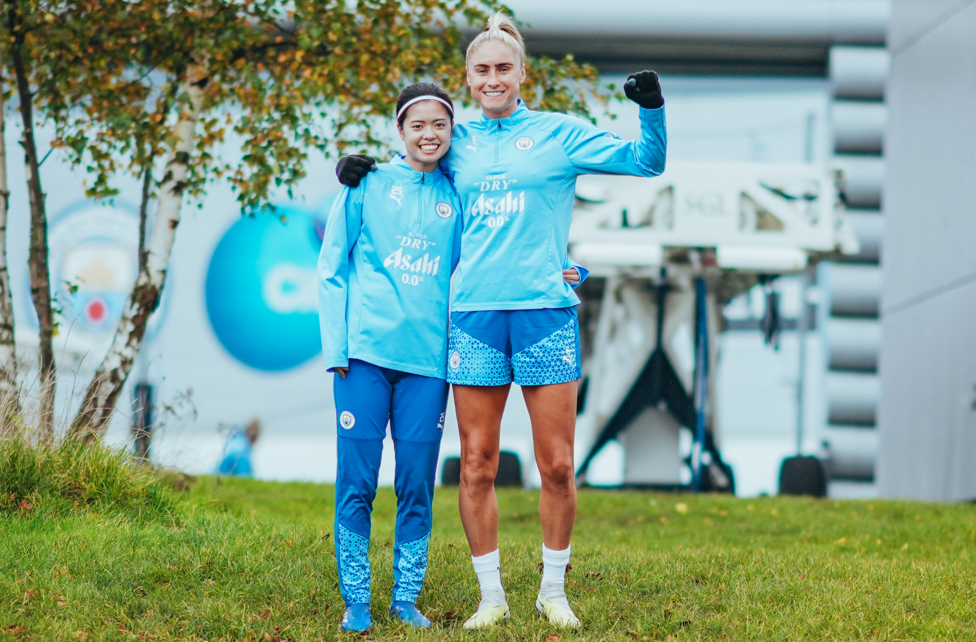 DYNAMIC DUO : Yui Hasegawa and Steph Houghton make their way onto the pitch.