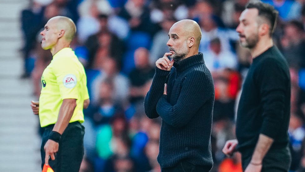 PONDERING PEP : The boss watches on from the touchline after the hosts equalise through Enciso.