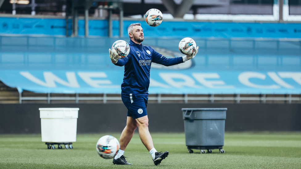 SAFE HANDS : Assistant Coach Chris Williams shows off his juggling skills