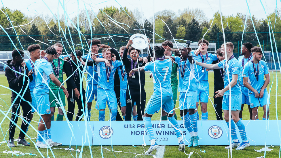 UNDER-18S NORTH WINNERS : Rico Lewis lifts the shield to mark City's regional success on 30 April