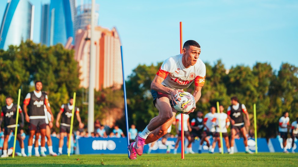 WRONG SPORT : Phil Foden shows off his rugby skills