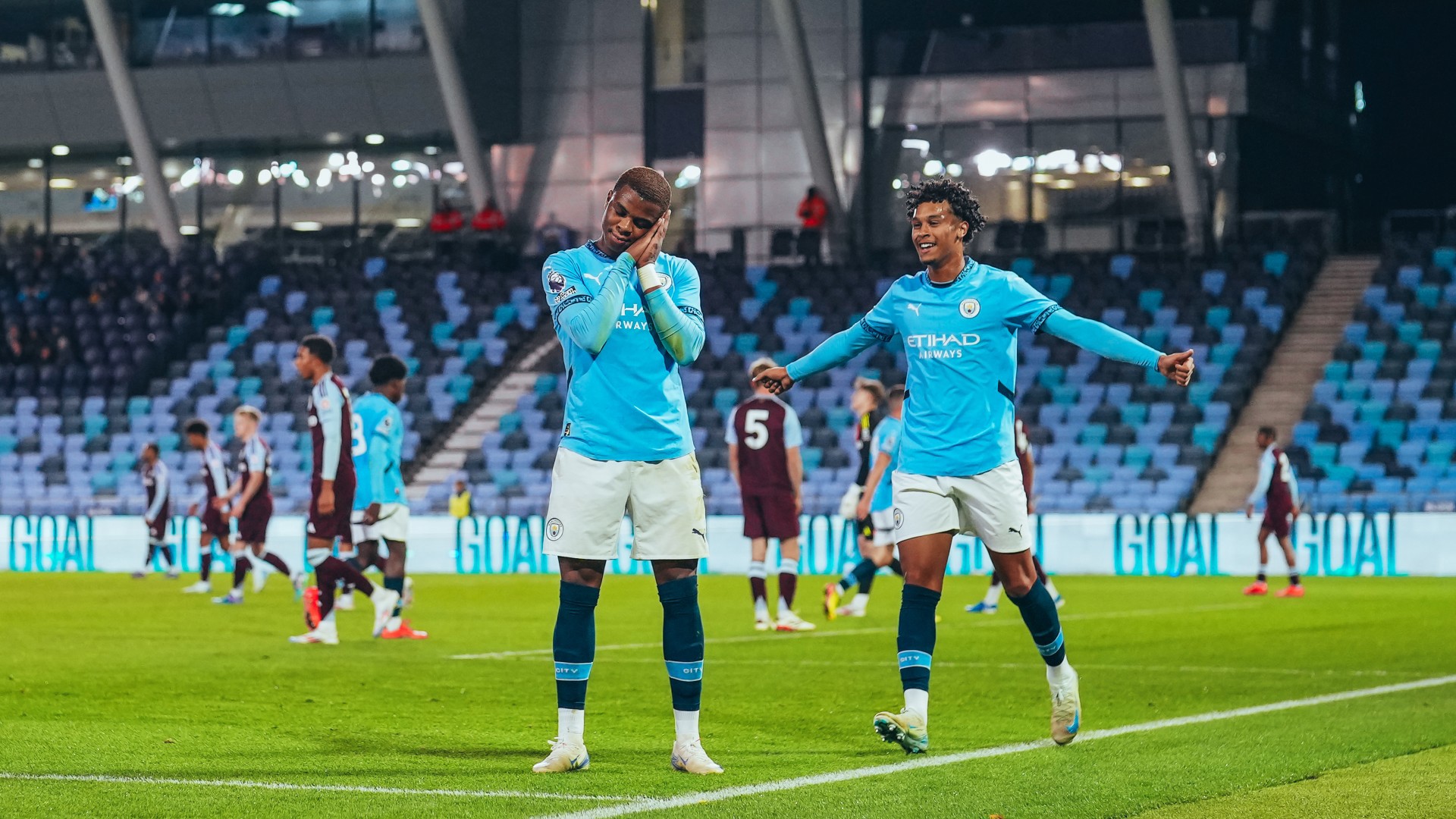 CELEBRATIONS : Farid Alfa-Ruprecht puts away City's second. 