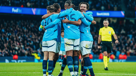 GROUP HUG: Gundogan feels the love!