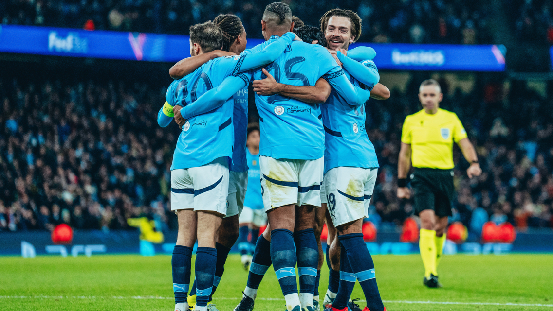 GROUP HUG: Gundogan feels the love!