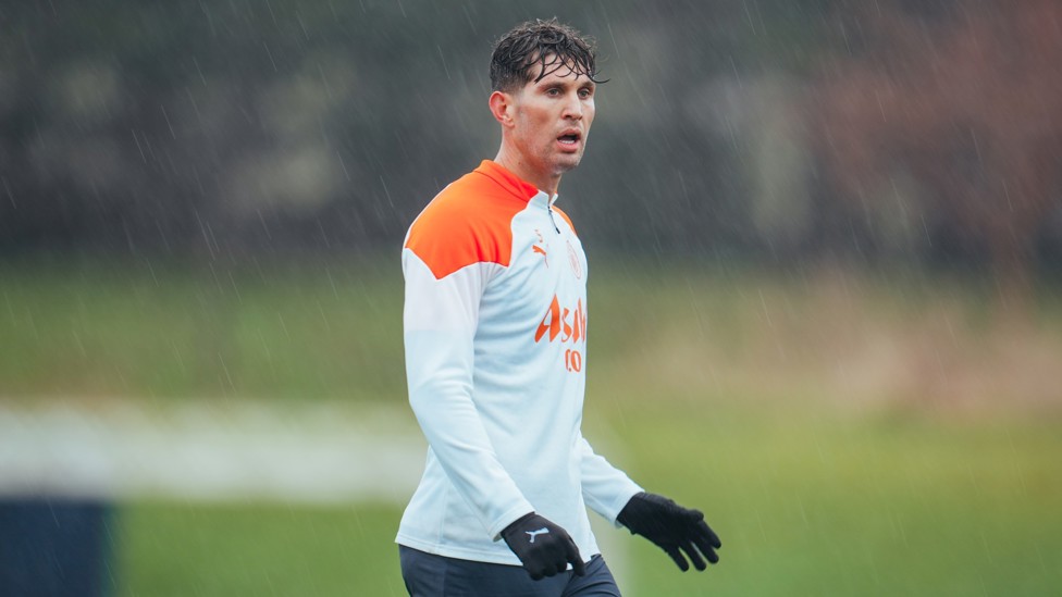 RAIN OR SHINE : John Stones putting in the hard work during training. 