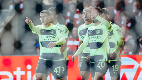 MAGIC MAHREZ: Foden points to Mahrez after his perfect assist.