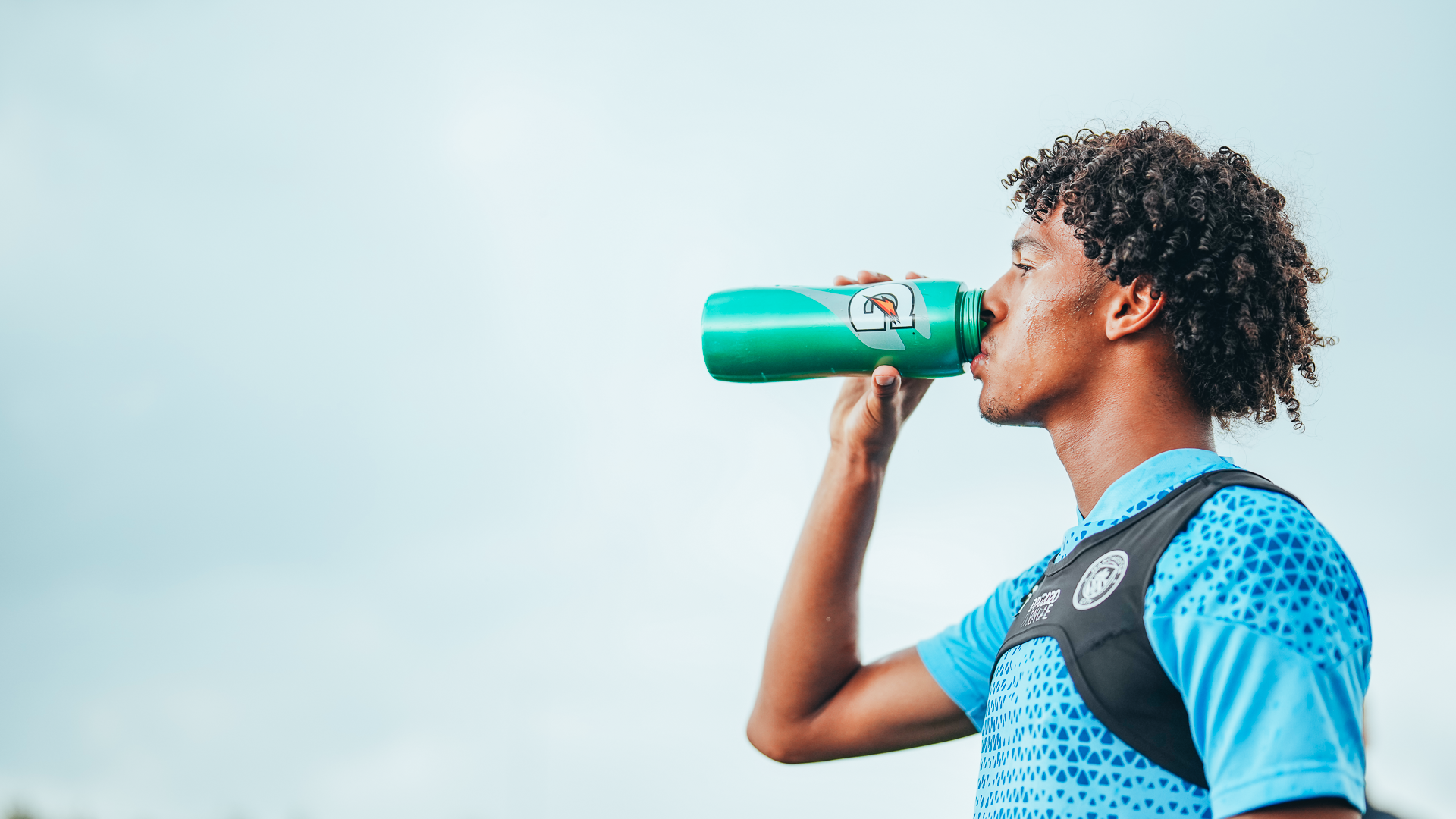 THIRSTY WORK: Emilano Lawrence takes the opportunity to rehydrate