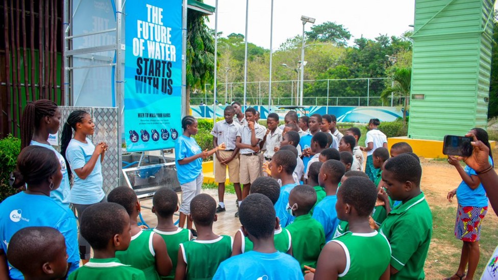 100 school children in Cape Coast, Ghana learn about hand washing at the recently installed Aqua Tower.