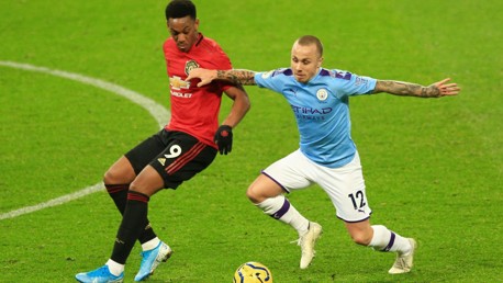 BATTLING: Angelino competes with Anthony Martial.