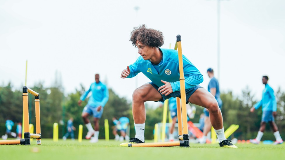 GET LOW : Matty Henderson-Hall warming up on the hurdles.