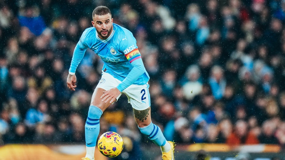 FLYING FULL-BACK : Kyle Walker brings the ball out from the back