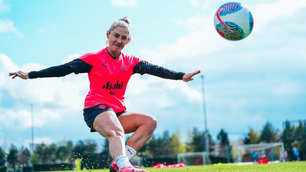 CLASSY COOMBS : Laura Coombs produces another precision pass out on the training fields