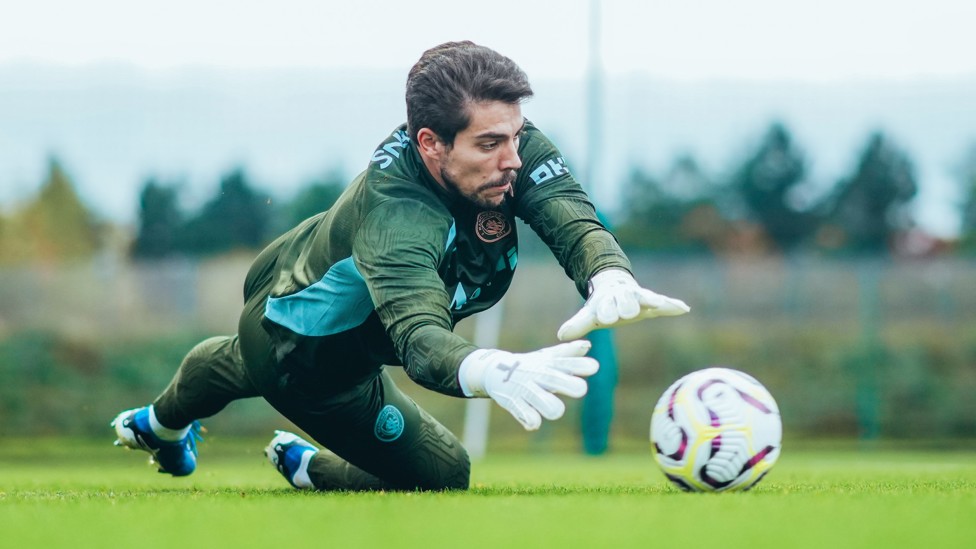 DOWN LOW : Stefan Ortega Moreno dives across to make the save