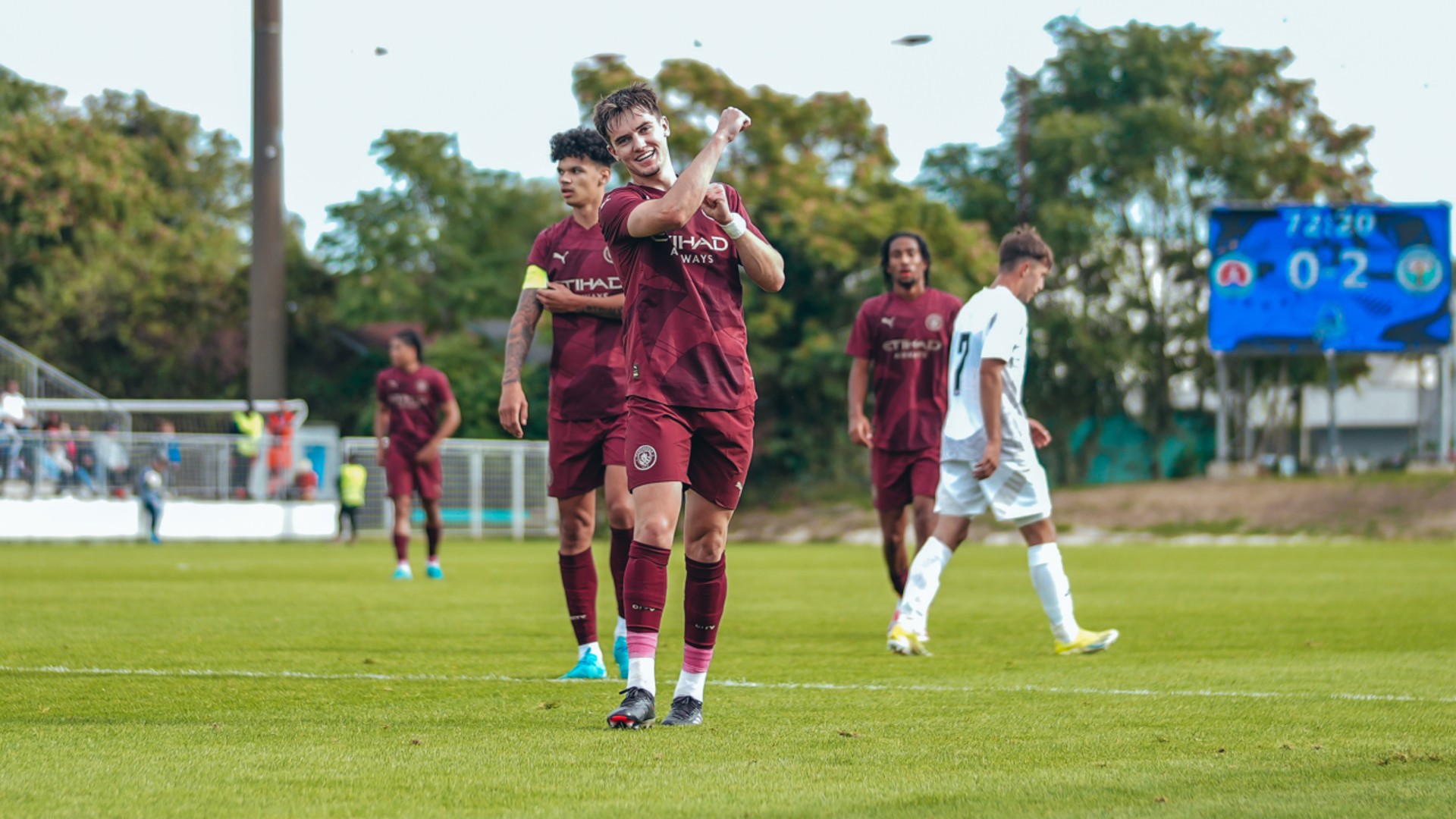 ALL SMILES: Jacob Wright celebrates his second goal.