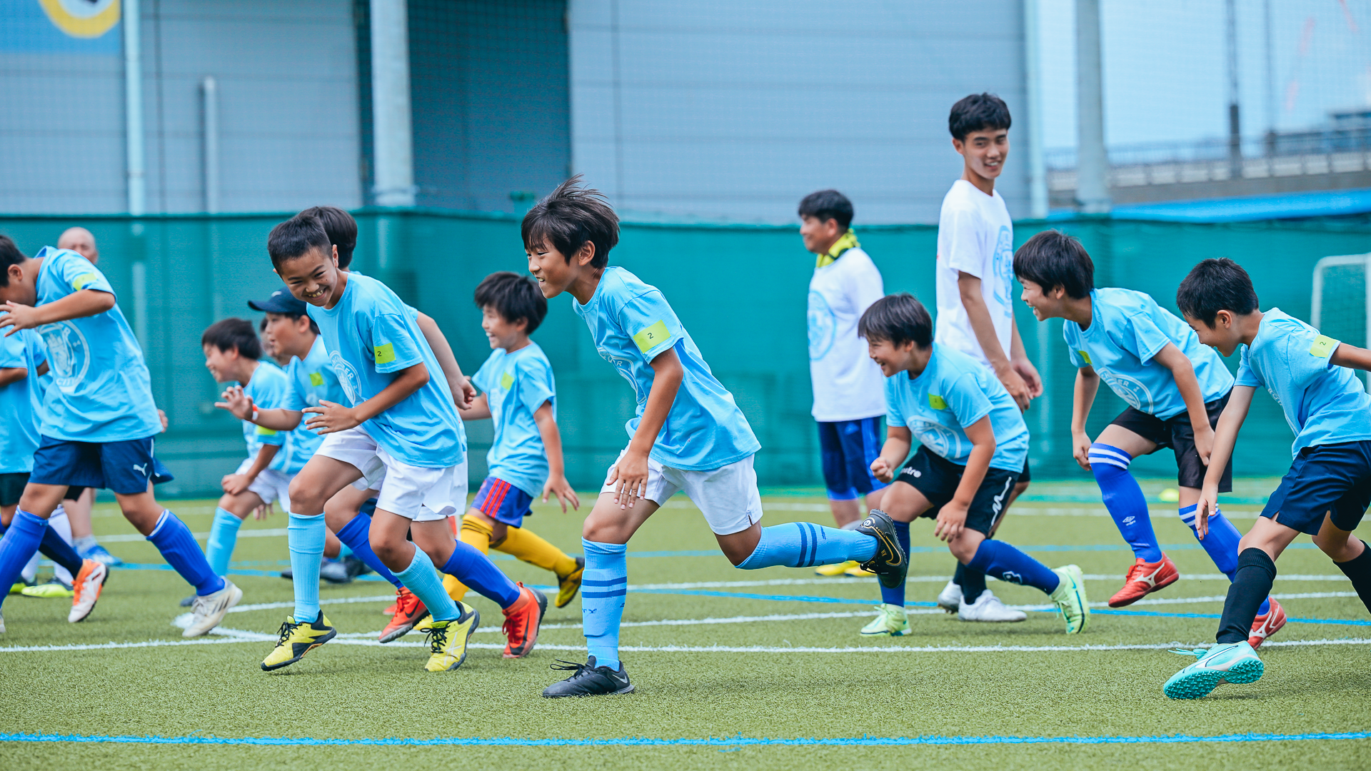 ON THE RUN: Some of the young participants go through their paces.