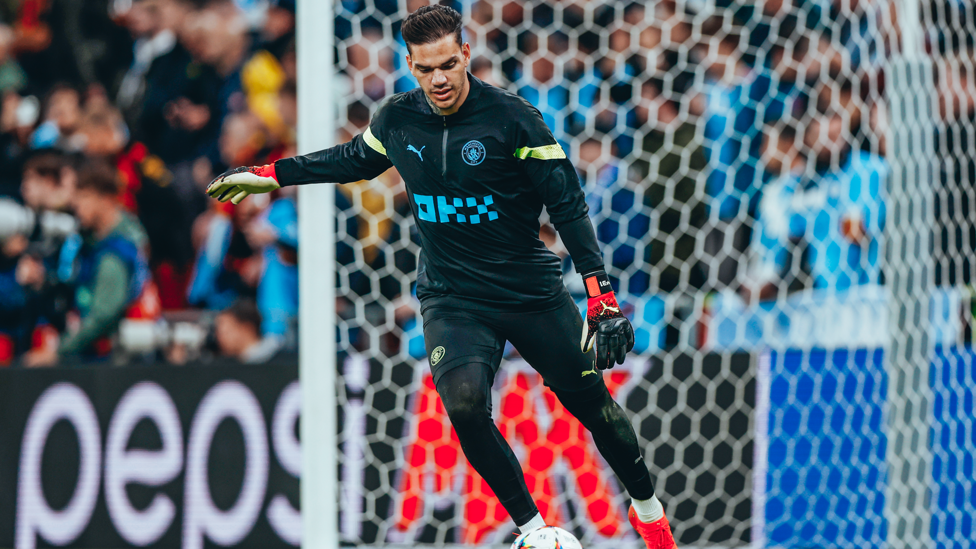 STEADY EDDIE : Our goalkeeper sprays a pass during the pre-match warm up.