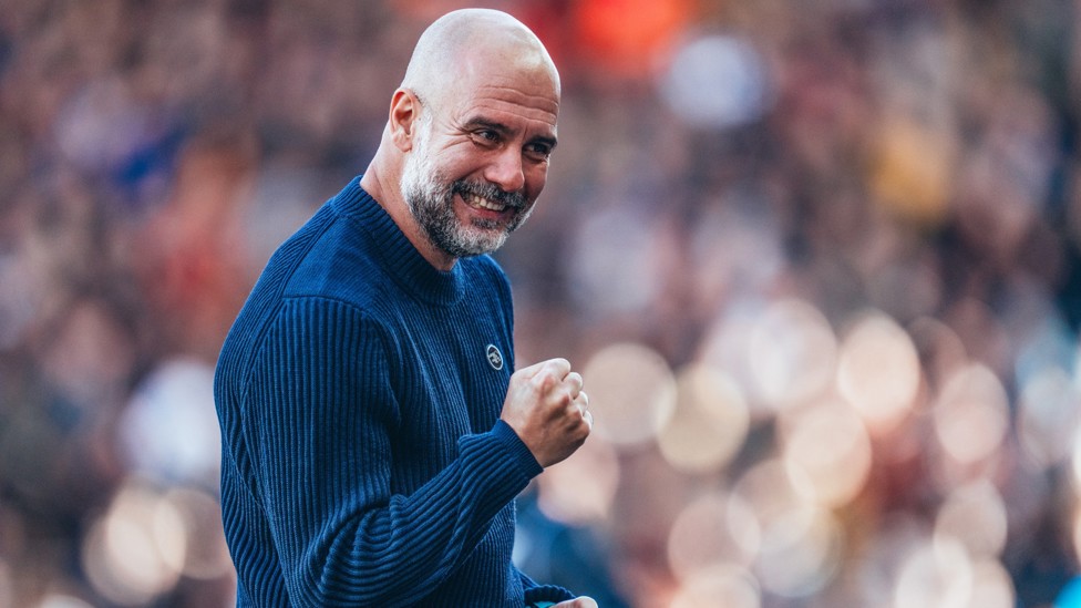 BOSSING IT : Pep Guardiola shows his delight after our last-gasp victory at Molineux