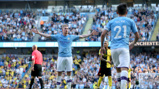 STANDING TALL: Kevin De Bruyne takes the Etihad's applause.