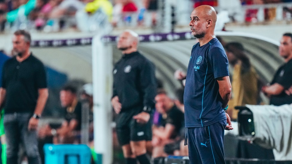 THE BOSS : Pep Guardiola watches on.