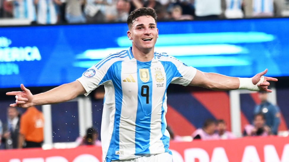 BACK TO IT : He celebrates the goal that put Argentina ahead in the last four clash