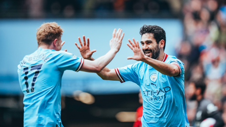 HIGH FIVES: KDB celebrates with Gundogan.