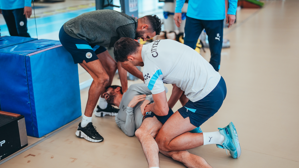 WHY ALWAYS ME : Ruben Dias and Riyad Mahrez get to grips with Bernardo Silva