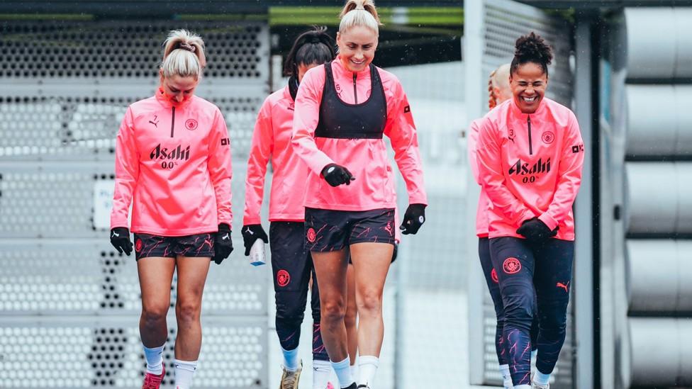 SQUAD GOALS : The players make their way out onto the pitch