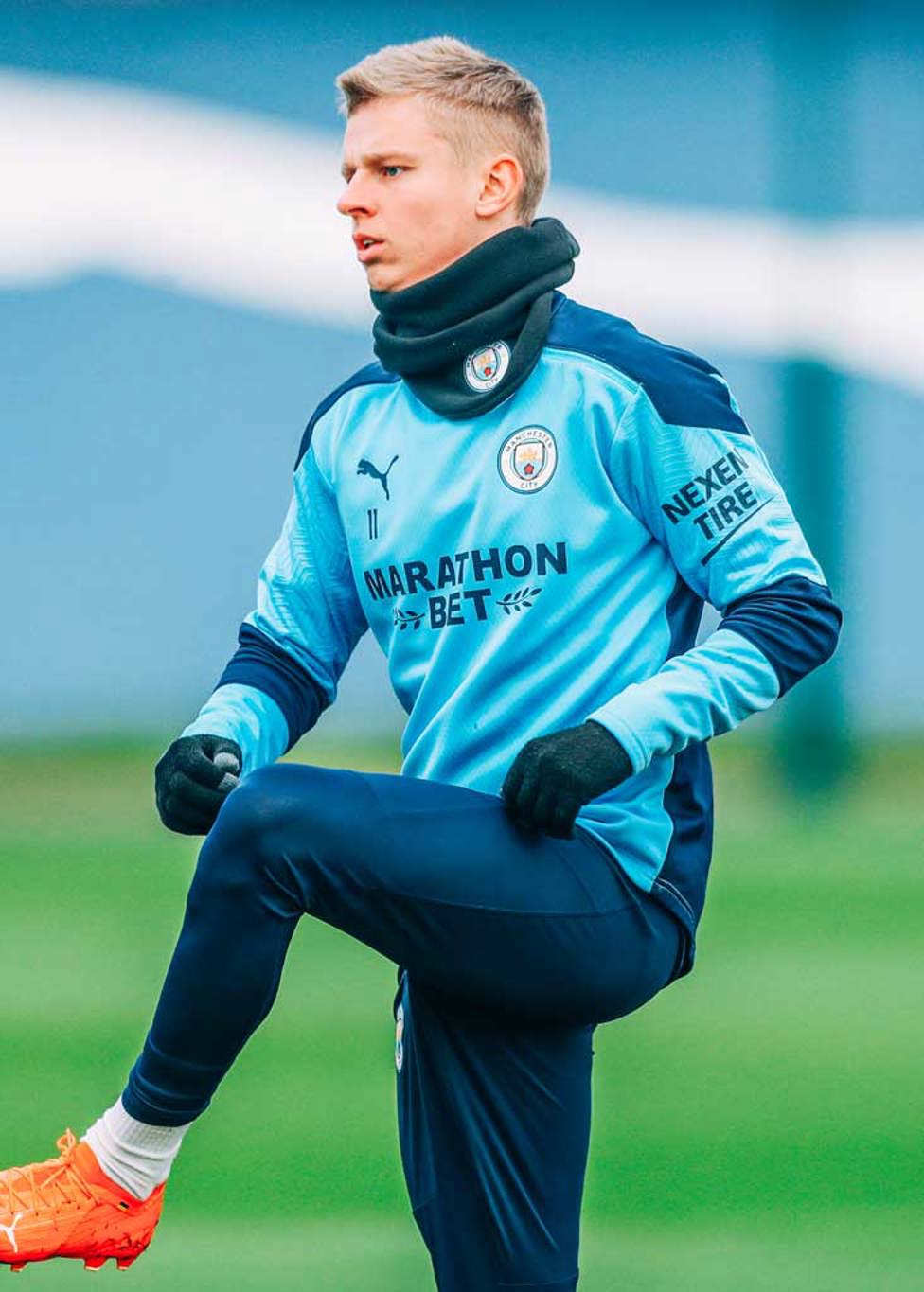 KNEES UP: Oleks Zinchenko stretches and flexes during Thursday's session