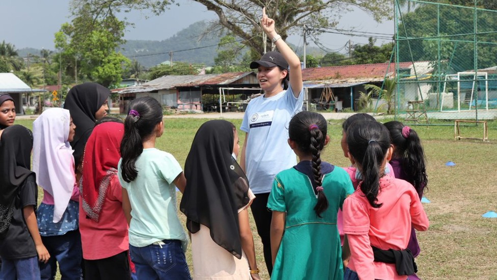 Josephine, a Young Leader from Kuala Lumpur, leads a water education session to 80 students in Penang, North Malaysia.