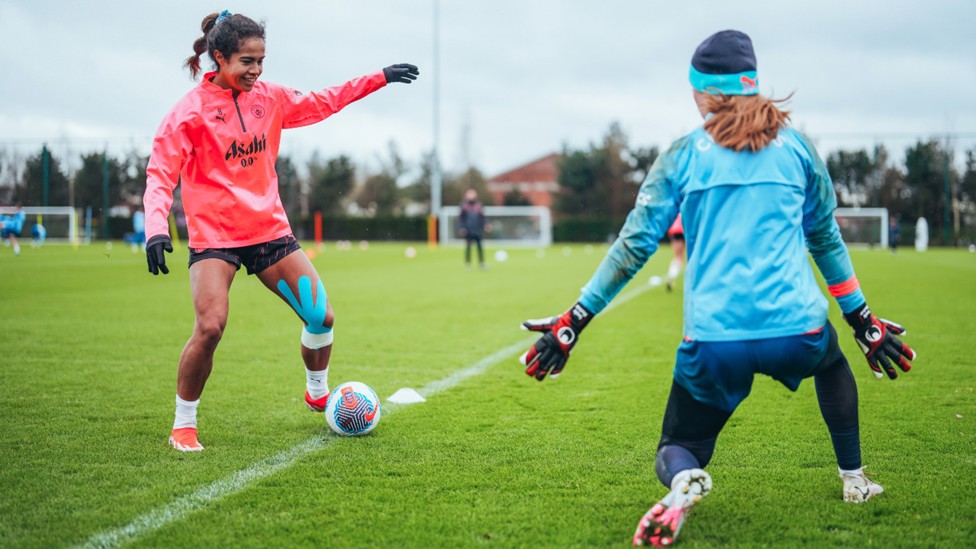 FRIENDLY FIRE: Mary Fowler takes on 'keeper Sandy MacIver.