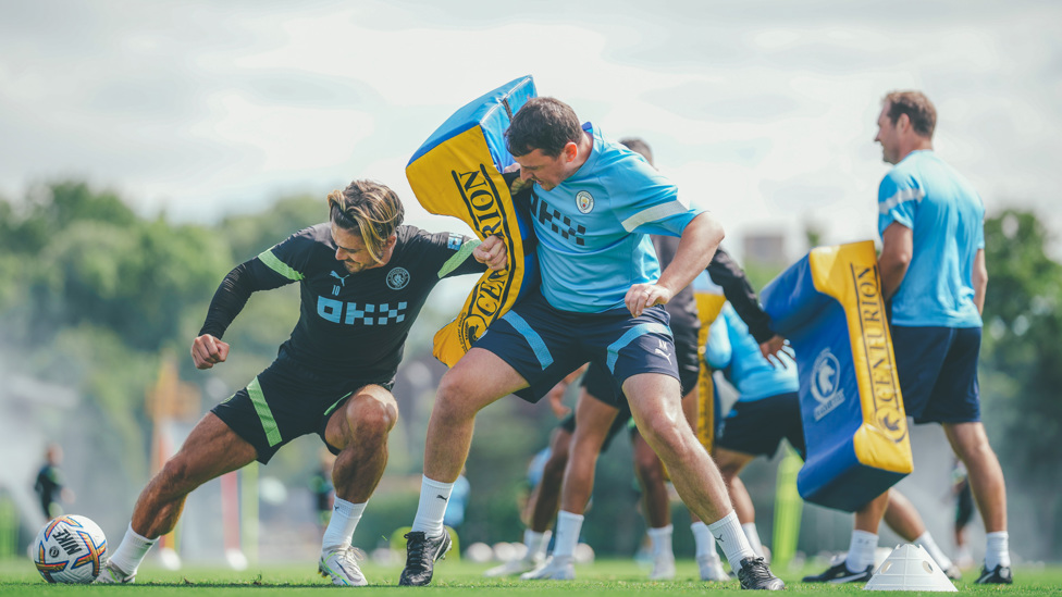 STRENGTH : Jack Grealish shields the ball