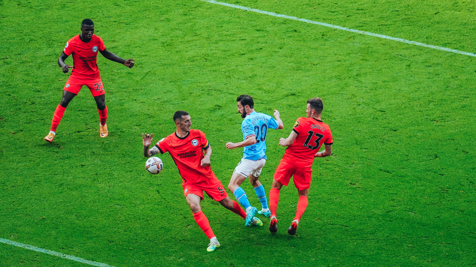 SILKY SILVA : Bernardo flicks the ball past Dunk and is tripped - penalty!