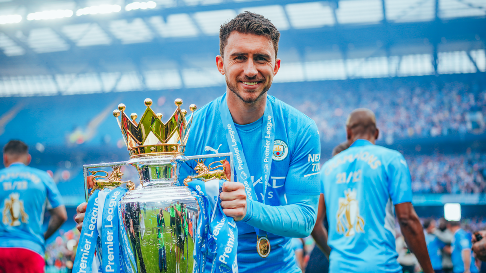 CHAMPIONS AGAIN! : Laporte pictured with the Premier League trophy following a thrilling end to the 2021/22 season.