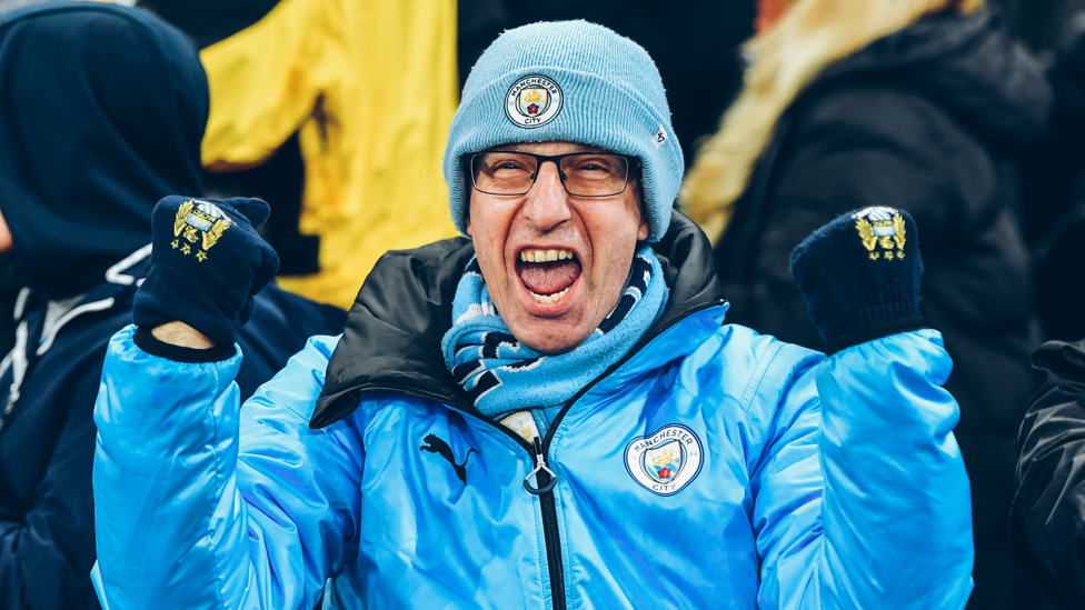 LIVE FOR CITY : A diehard fan enjoying the excellent football on show