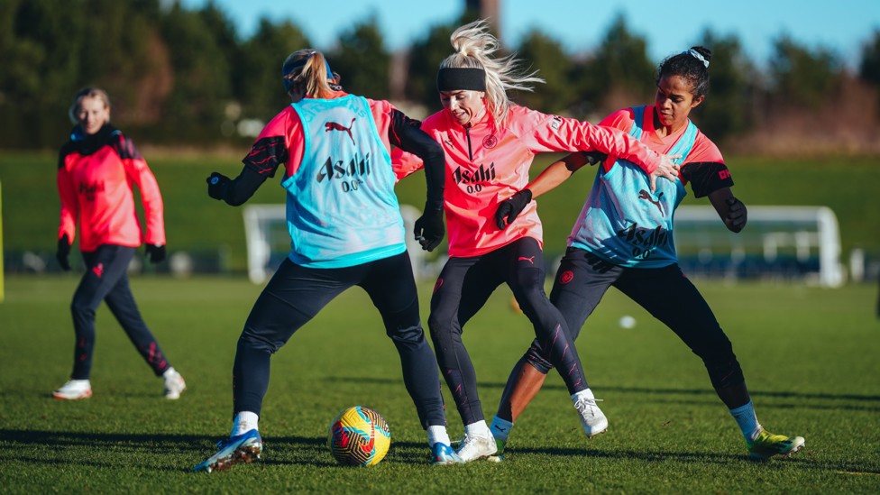 DODGE AND WEAVE : It must take two players to tackle Alex Greenwood!