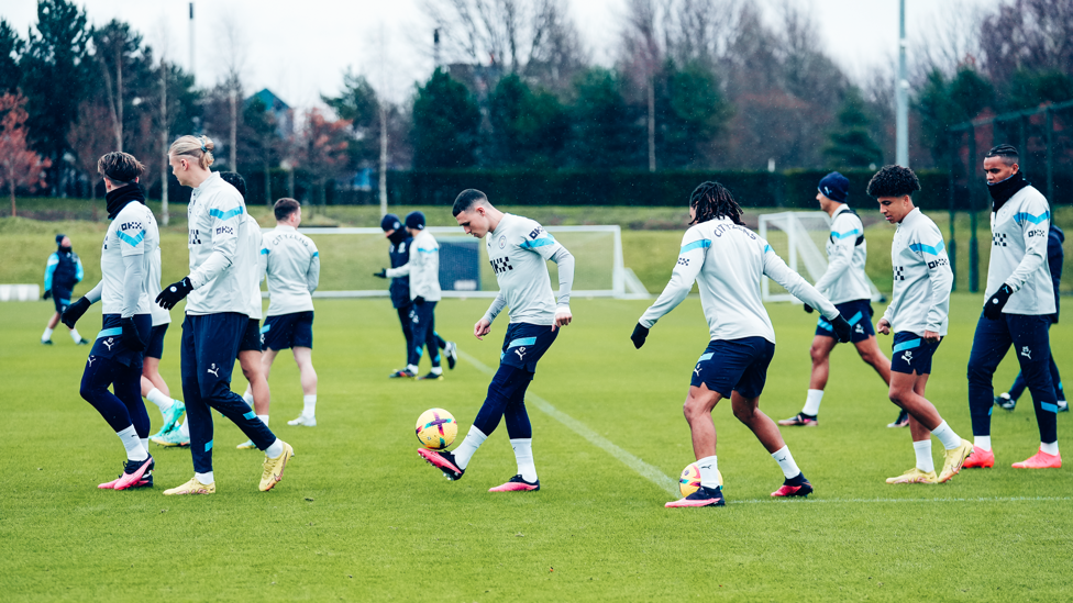 KEEPY UP : Phil Foden juggles the ball in a crowd of players