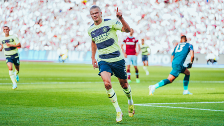 MAKE THAT TWO: Haaland wheels away to celebrate his second goal.